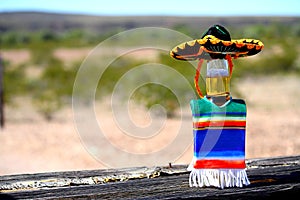 Cinco de Mayo beer with sombrero and poncho. photo